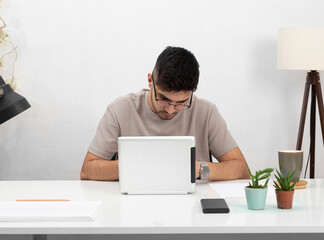 Young man working in home office.education.business.e-commerce