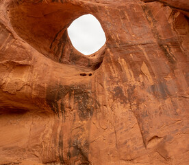 Moccasin Arch deep in Monument Valley, Sandstone Arch