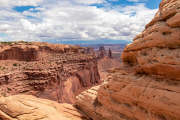 Selective focus on Mesa Arch near Moab, Canyonlands National Park, San Juan County, Southern Utah, USA. Looking at natural pothole arch rock formation on the eastern edge of Island in the Sky Mesa