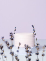 Round spring podium with lavender flowers on violet background. Display for product, cosmetic and...