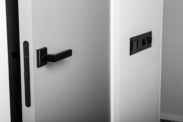 Minimalistic gray interior door with black door handle