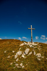 Cross up in the Alps mountains