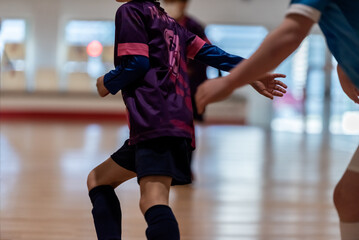 Fototapeta premium a player escapes her opponent's dribble