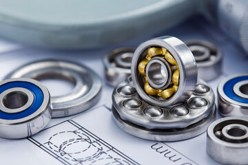 bearings of different types, micrometer, caliper and ruler on the drawings of technical products....