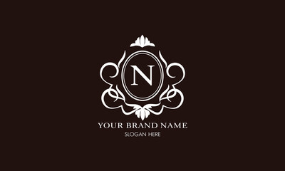 Vector illustration of letter N logo template. Classic floral monogram with decorative elements.