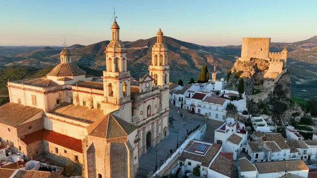 aerial view of Castillo de Olvera Towering On White Village In Olvera, Province of Cadiz, Spain