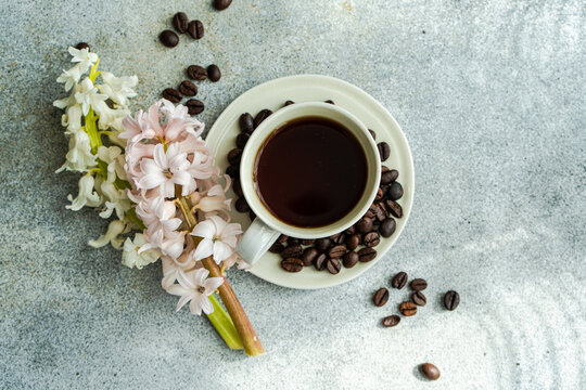 Black coffee with spices and flowers