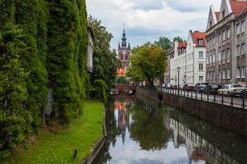 Fototapeta na wymiar View of street and St Catherine's Church in Gdansk, Poland