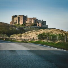 Fototapeta na wymiar Beautiful view of Bamburgh castle on the Northumberland coast in the morning