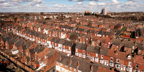 Aerial panorama of rows of back to back terraced houses in the North of England