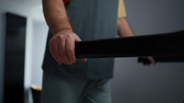 Senior Man Walking On Treadmill At Home, Closeup View Of Hands On Handrails, Sport Activity