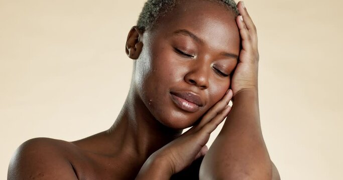 Skincare, beauty and black woman touch face for facial treatment, wellness and cosmetics in studio. Dermatology, spa aesthetic and portrait of African girl with glowing, healthy and natural skin