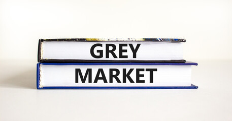 Grey market symbol. Concept words Grey market on books. Beautiful white table white background. Business grey market concept. Copy space.