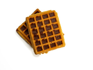 Chocolate waffles isolated on white background. Waffles in chocolate. Close-up.