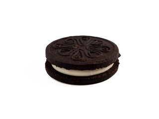 Black tasty cookies isolated on white background. Close-up.