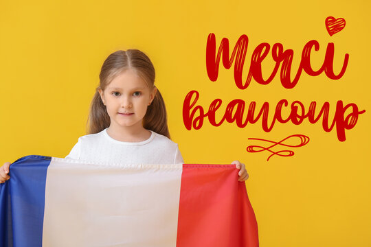 Little girl with the flag of France on yellow background. International French Language Day
