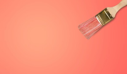 Classic art paintbrush on pastel background