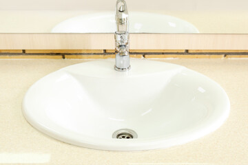 White ceramic sink on table