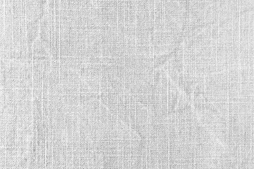 Natural white linen fabric texture background. Flax cloth surface, tablecloth, upholstery, curtains...