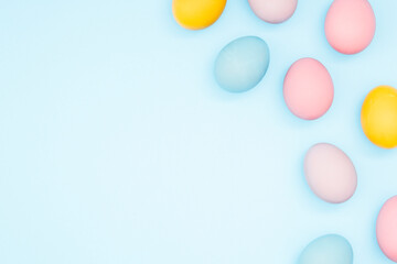 Easter eggs, pastel colors, top view. Flat lay, Easter background design