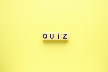 Quiz, the inscription on a yellow background