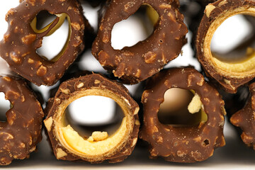 Chocolate cones on a monochrome background