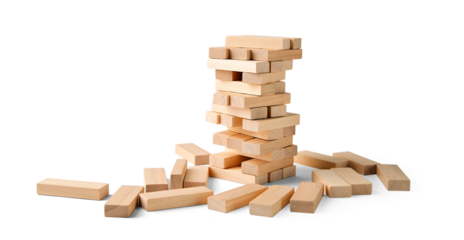 Jenga tower of wooden blocks isolated with shadow, place for text. The concept of destruction, instability.
