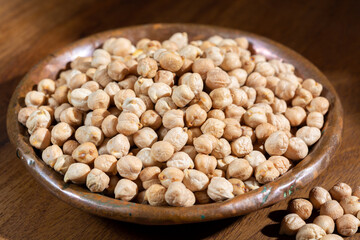 Portion of dried uncooked chick peas close up