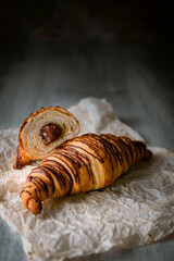 Bakery shop products - various kinds of baguette, bagel, donut, croissant, rolls, bread, puff pastry, powdered sugar delicious pies. Neutral background. Food from bakeries.