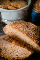 Bakery shop products - various kinds of baguette, bagel, donut, croissant, rolls, bread, puff pastry, powdered sugar delicious pies. Neutral background. Food from bakeries.