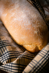 Bakery shop products - various kinds of baguette, bagel, donut, croissant, rolls, bread, puff pastry, powdered sugar delicious pies. Neutral background. Food from bakeries.