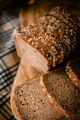 Bakery shop products - various kinds of baguette, bagel, donut, croissant, rolls, bread, puff pastry, powdered sugar delicious pies. Neutral background. Food from bakeries.