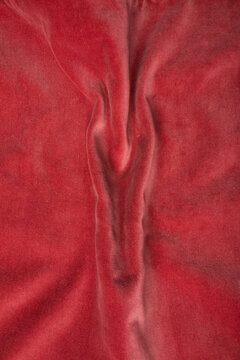 Pink soft fabric shaped as female genital organs, vulva and labia, vagina concept