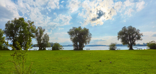Fototapeta na wymiar Beautiful view of Lake Chiemsee from “Fraueninsel“ in Bavaria, Germany.