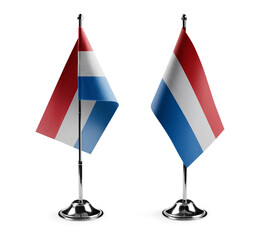 Small national flags of the Netherlands on a white background
