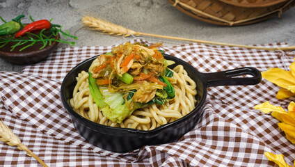 Mie Ayam Pangsit (Noodles with Chicken and vegetables ) is Indonesian popular food.