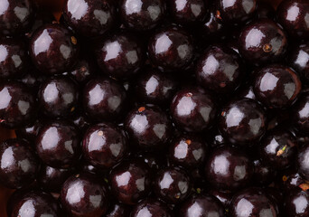 Closeup of Jabuticabas or brazilian grapes. Fruit backdrop
