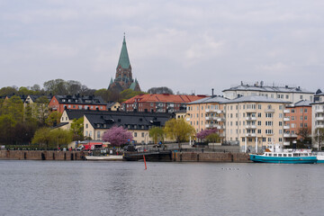 Stockholm. buildings with a red and black roofs.