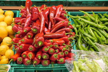  green and red capsicum displaying at shop 