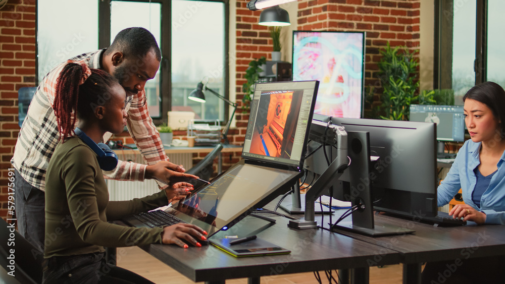 Poster game industry developers working on artistic development design with multiple displays on desk. team