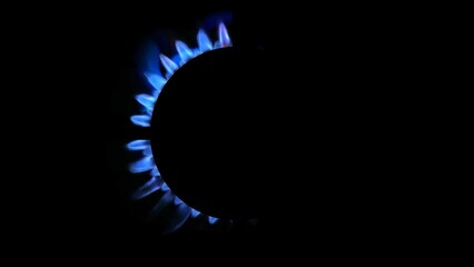 3D rendering of a kitchen burner glowing at night, close up
