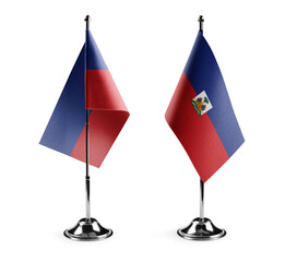 Small national flags of the Haiti on a white background