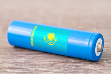 Flag of Kazakhstan on li-ion battery. Production of batteries in Kazakhstan concept