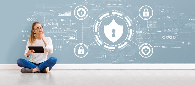 Cyber security theme with young woman holding a tablet computer