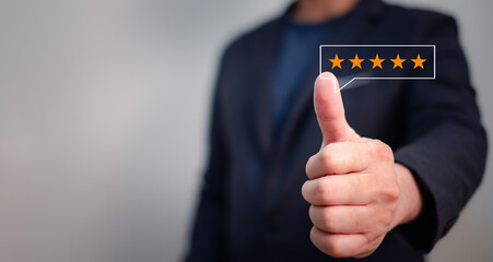 customer satisfaction concept, business man giving thumb up with five stars symbol for positive feed back with satisfied in quality of service