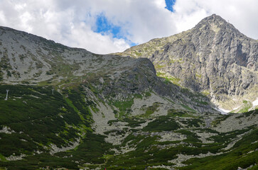 Skalnate pleso at the lowest corrie of the Rocky Valley and peak of Lomnicky Stit at the National park High Tatras, Slovakia