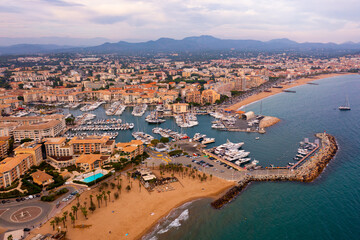 Aerial panorama of Frejus cityscape and vessels in harbor, France - obrazy, fototapety, plakaty