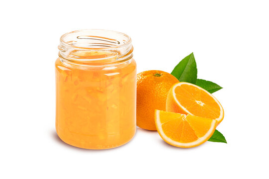 jar of orange jam with orange and leaves isolated on white background.