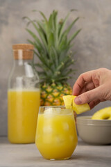 Rum cocktail with pineapple puree and coconut