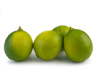 Fresh ripe green limes isolated on white background.